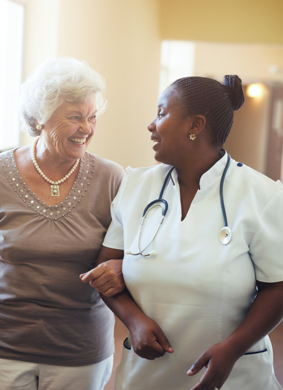 female-social-worker-taking-care-old-man