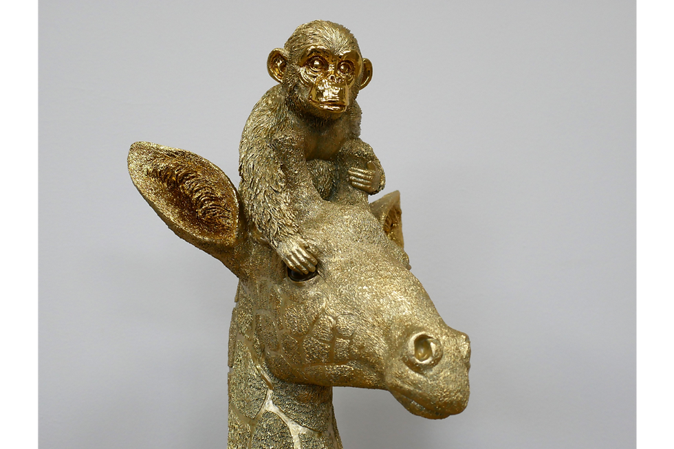 Thumbnail: golden giraffe ornament with monkey perched on the giraffes head