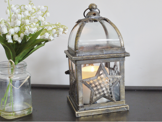 antique style small lantern with a star pattern