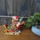 Thumbnail: Large Highland Cow in Santa’s Sleigh Figurine