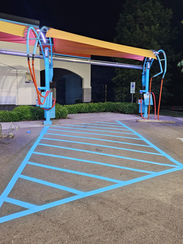 Re-stripe the handicap paint at a carwash