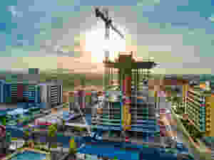 extreme aerial production drone image of building construction with crane