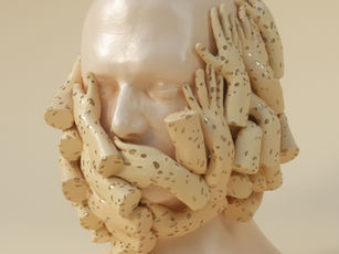 Surreal bald head wrapped in beige, perforated handlike forms over the face against a plain cream background.