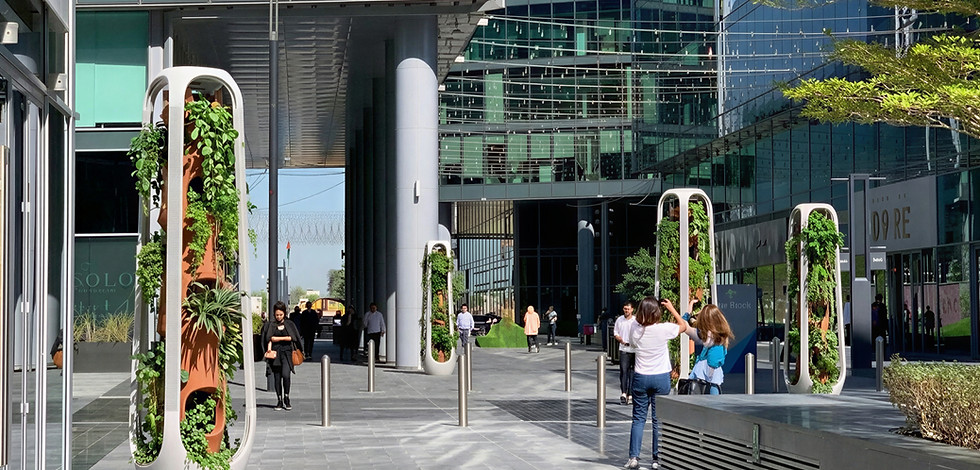 2x_imagine a scene of public downtown greenery installation, keep the scene the same and m