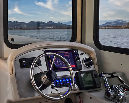 a view from inside the boat named Baby Doll on the Kelowna Luxury Boat Tours.