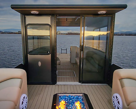 a view from the back deck of the Baby Doll, part of the Kelowna Luxury Boat Tours, looking out over the lake.