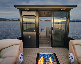 Absolutely, let’s add that in. We can say something like “Aboard the Kelowna Luxury Boat Tours’ Baby Doll, a guest sits at th