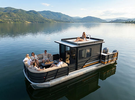 People enjoying a luxury boat on the water with mountain views kelowna luxury boat tours