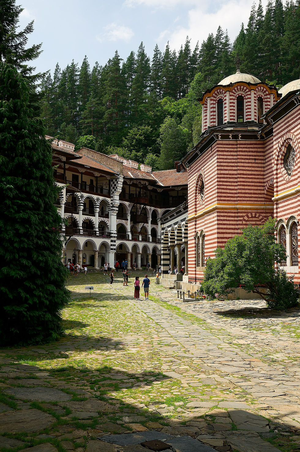 Side view of the church and courtyard at Rila Monastery.