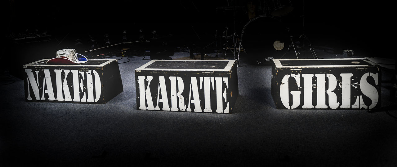 Naked Karate Girls Stage boxes for public shows.