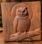 Hand-carved owl in a woodworking portfolio gallery