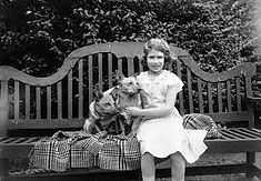 elizabeth as child with dogs.jpg