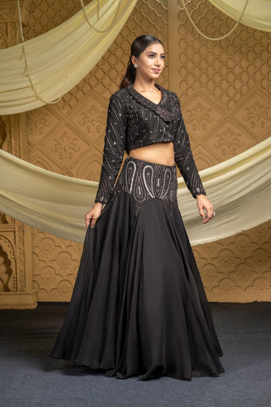 Black Heavily Embellished Cropped Blazer Paired Up With A Embellished Skirt