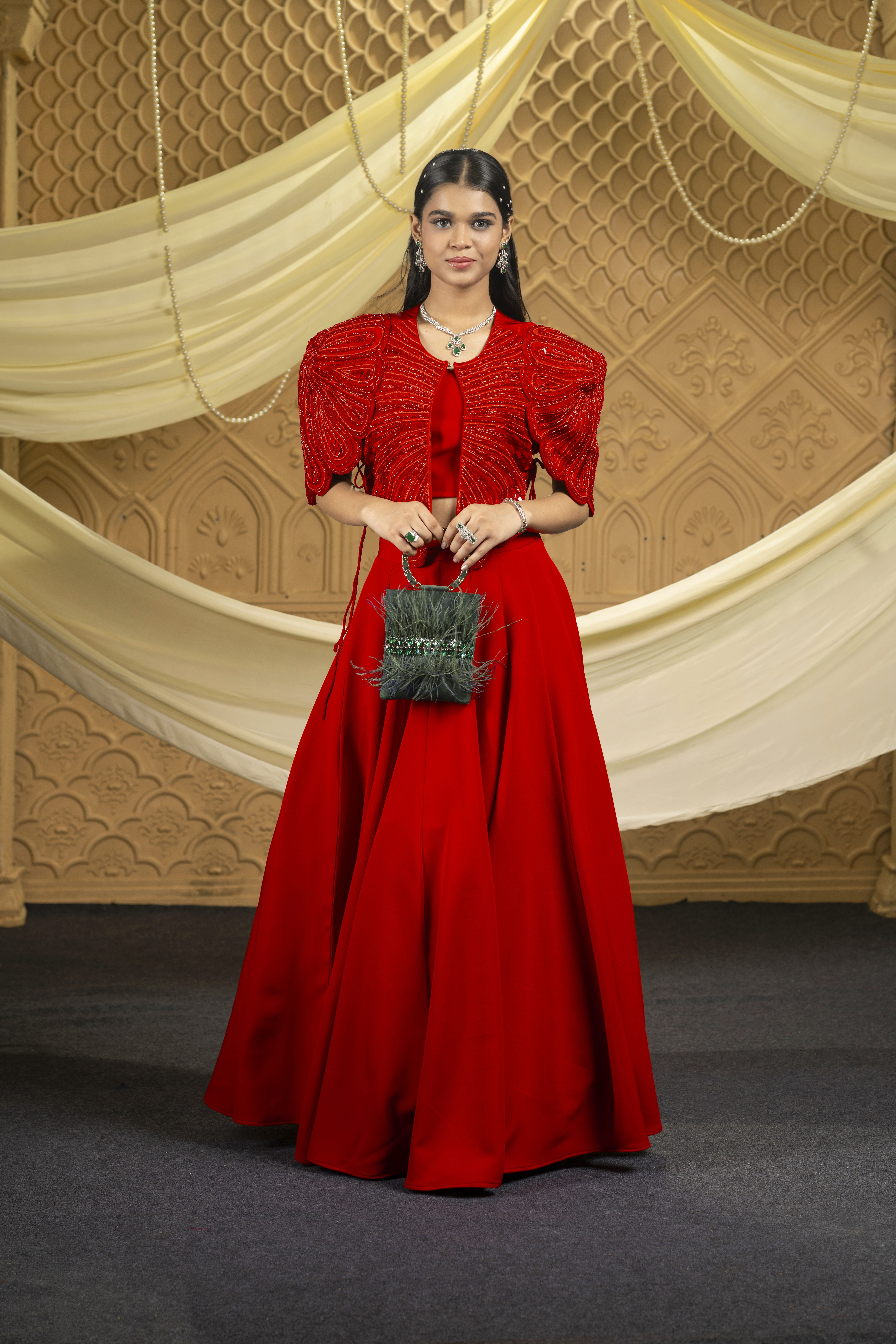 Red Lehenga Heavily Embelished Jacket Paired Up With Skirt And An Inner