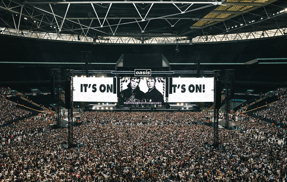 Oasis live at Wembley, London - rock and roll revival with a passionate crowd, July 2025.