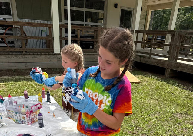 campers tie dying shirts