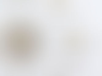Detail of clock and watch piece artwork on white background