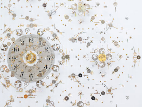 Detail of clock and watch piece artwork on white background