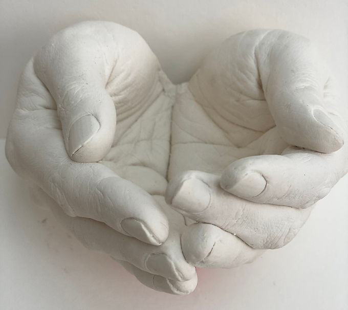 Cupped hands sculpture