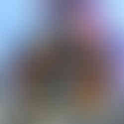 2026 Walt Disney World Marathon medal featuring Mickey Mouse and Minnie Mouse in running gear, high-fiving in front of a menacing Maleficent dragon. The medal has gold trim with “Marathon” text and the runDisney logo at the bottom, with Cinderella Castle blurred in the background.