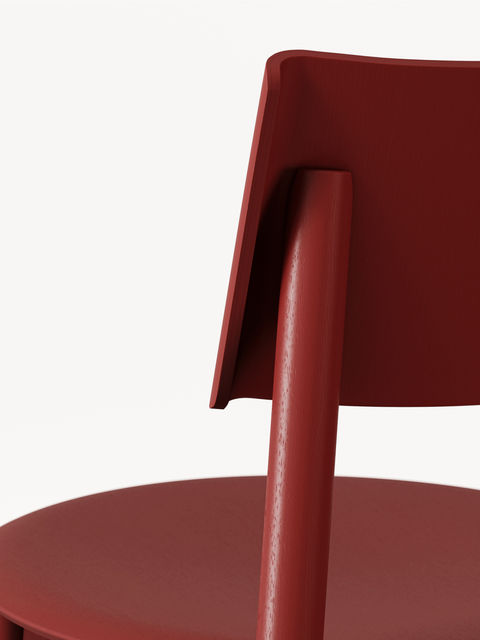 Close-up 3D render of red chair showing material texture and detail