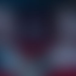 Ryan Gosling and Emma Stone sitting in a theater in La La Land