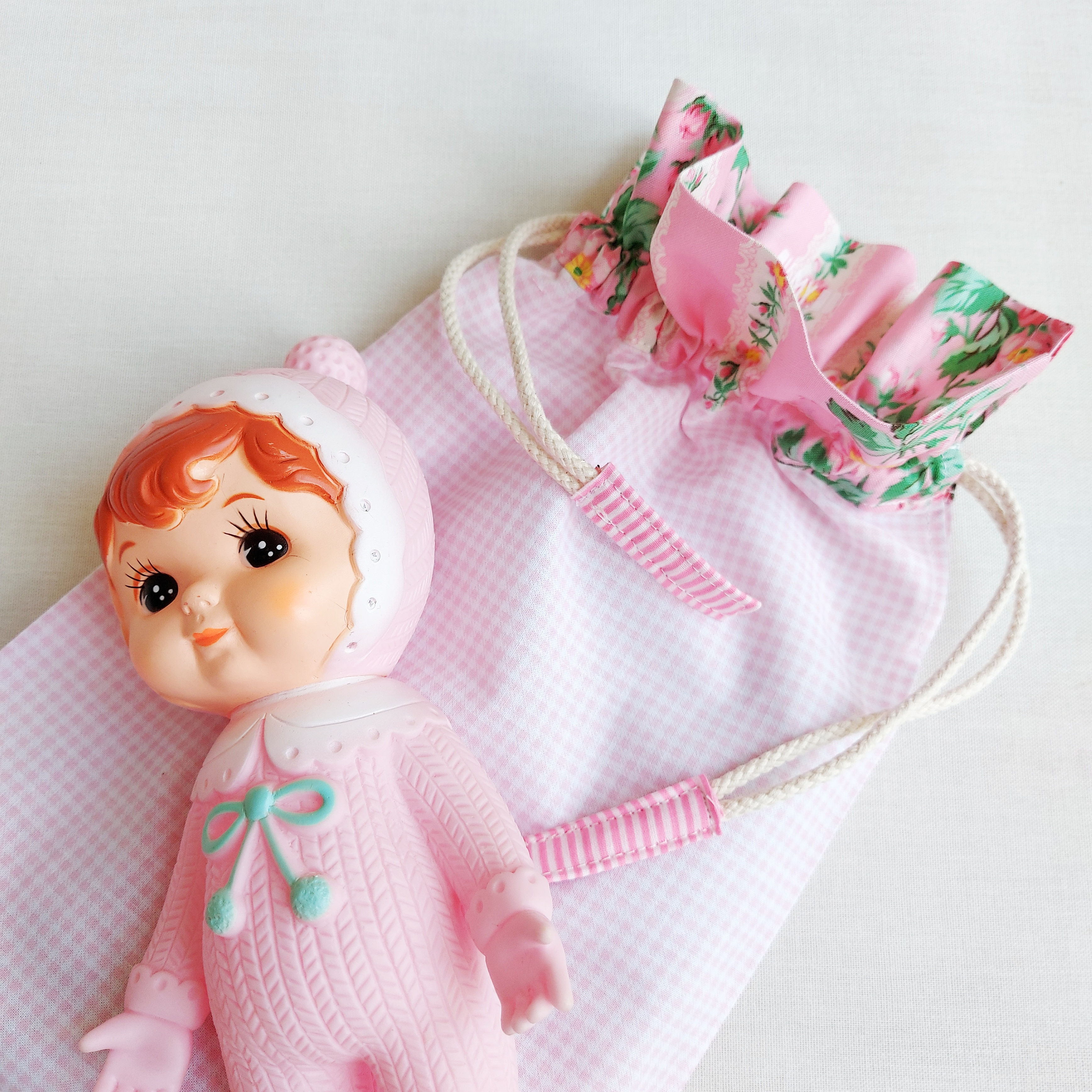 Saco rosa xadrez* rosa flores