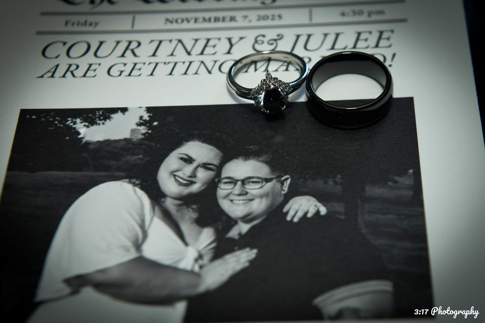 Delaware wedding photography featuring wedding rings resting on a custom invitation at The Farmhouse, Delaware.