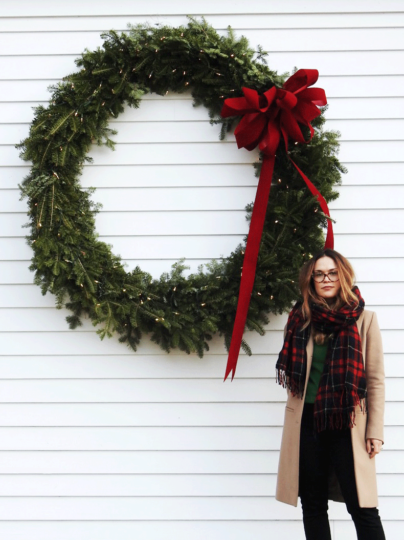 natasha habermann in front of wreath