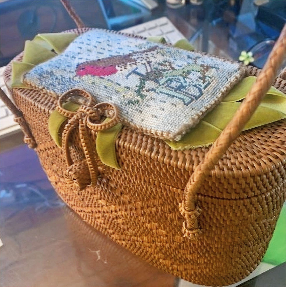 wicker bag with needlepoint