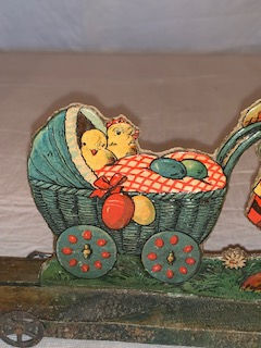 Thumbnail: #128  Rabbit Die cut with baby carriage on platform