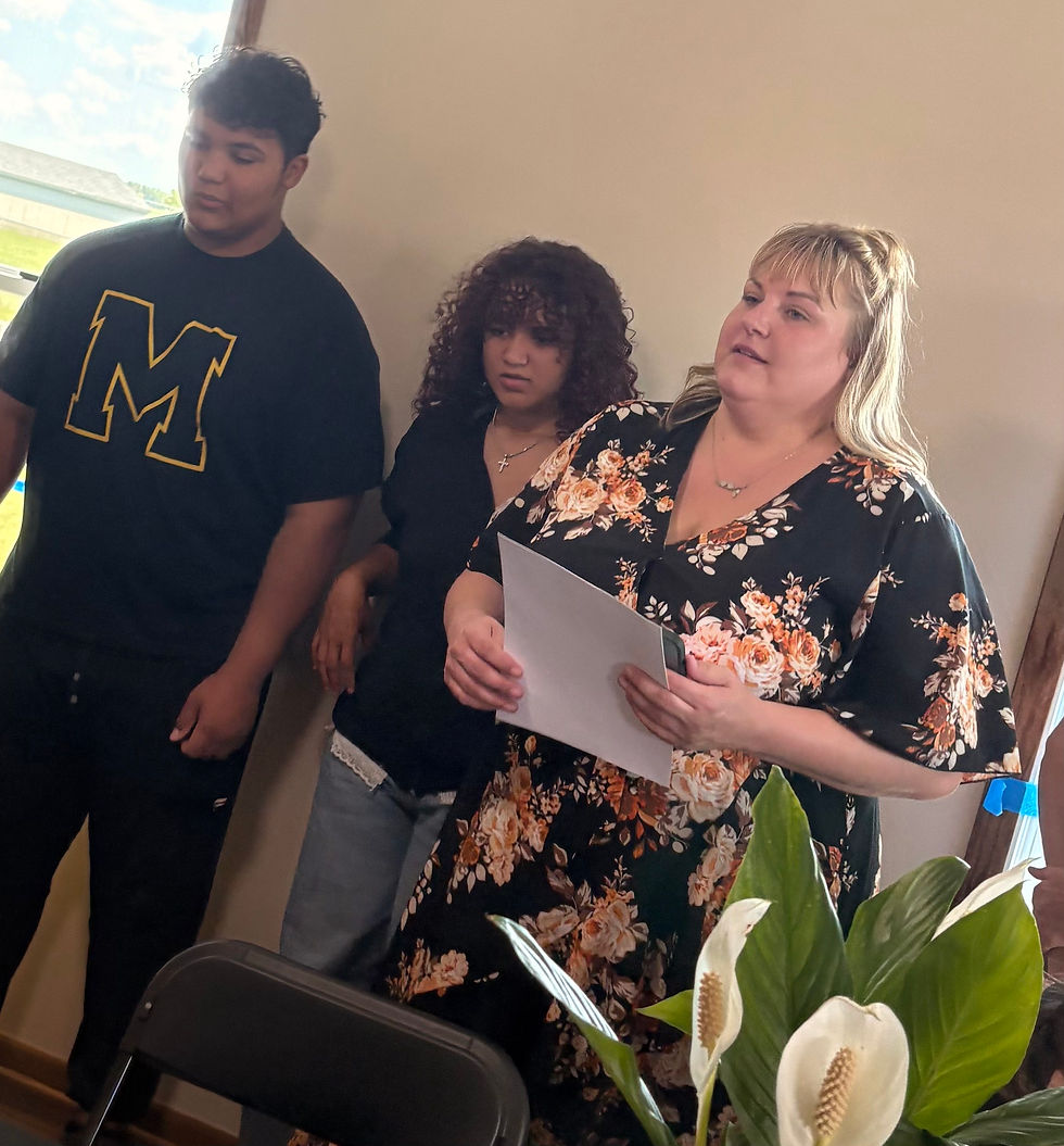 Naomi and her family in Kenyon, MN, in her new home. Congratulations and welcome to home ownership Naomi!