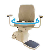 Stairlift with blue arrow illustrating how seat swivels