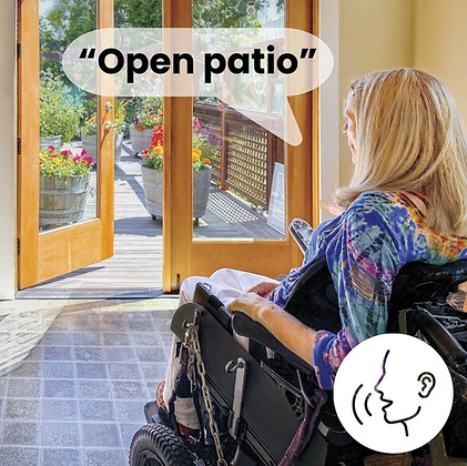 A woman in wheelchair speaking "Open patio" with the door open to her outdoor patio