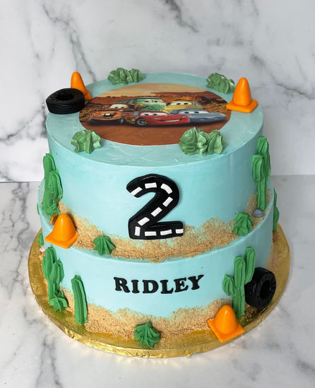 Cars theme with fondant writing, cone, tires
