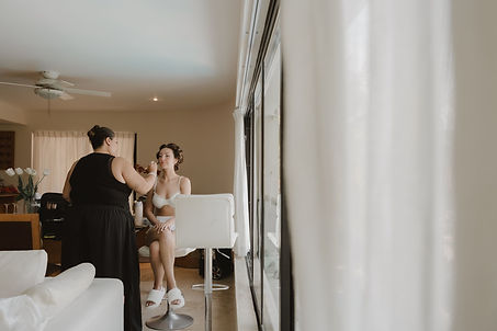 ridal makeup application before a Riviera Maya wedding