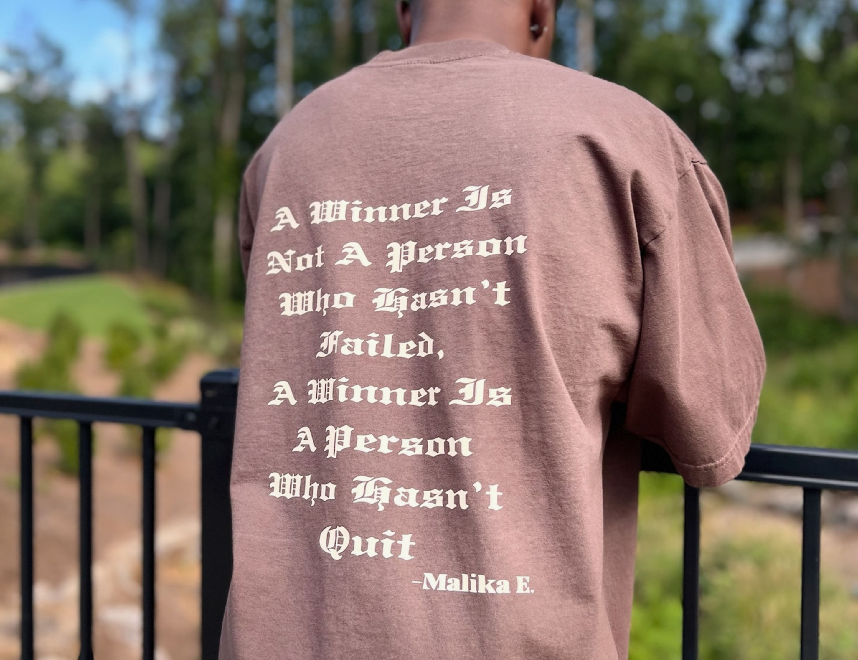 "A Winner's Quote" - Drop Shoulder Short Sleeve T-Shirt