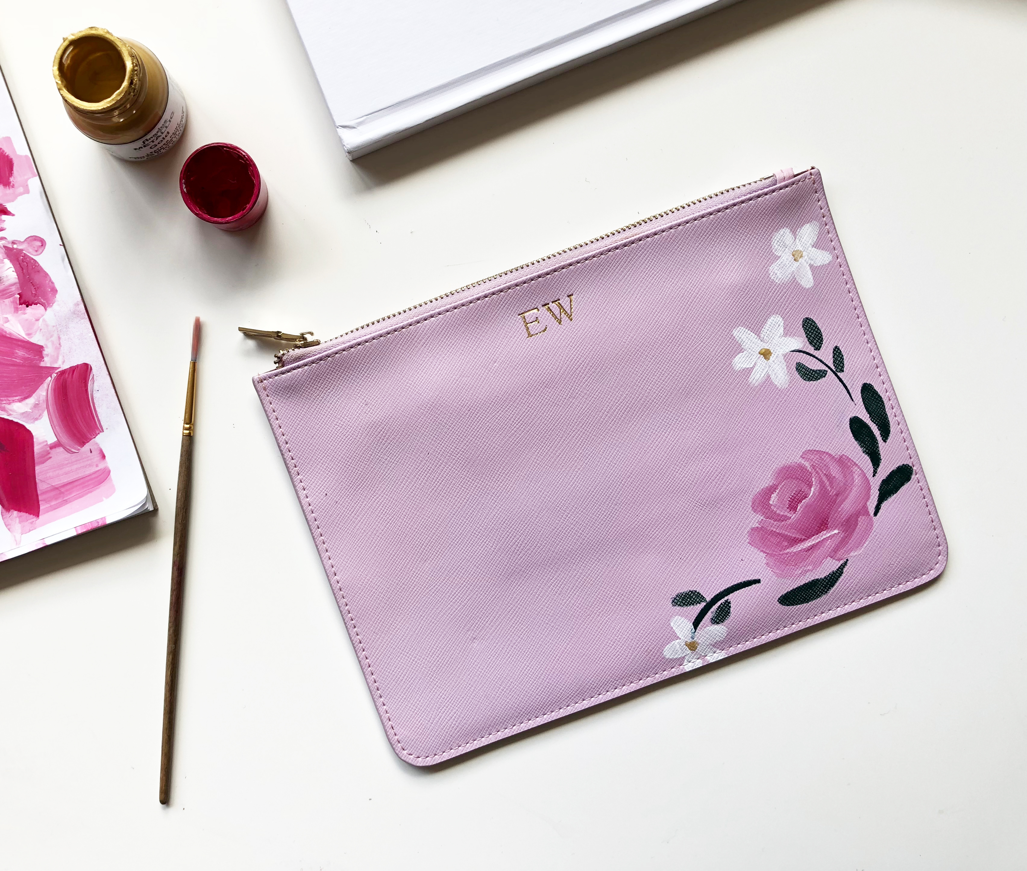 Flower painting on a TDE. bag