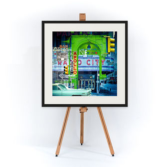 Framed limited edition print in a black box frame