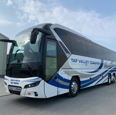 White and blue coach from right side.jpeg