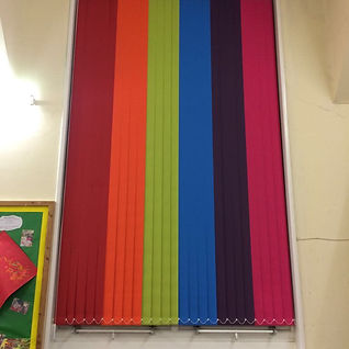 Colourful vertical blinds in rainbow colours