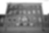 Landscape view of dance school and students in front