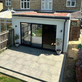 Complete house extension with patio area