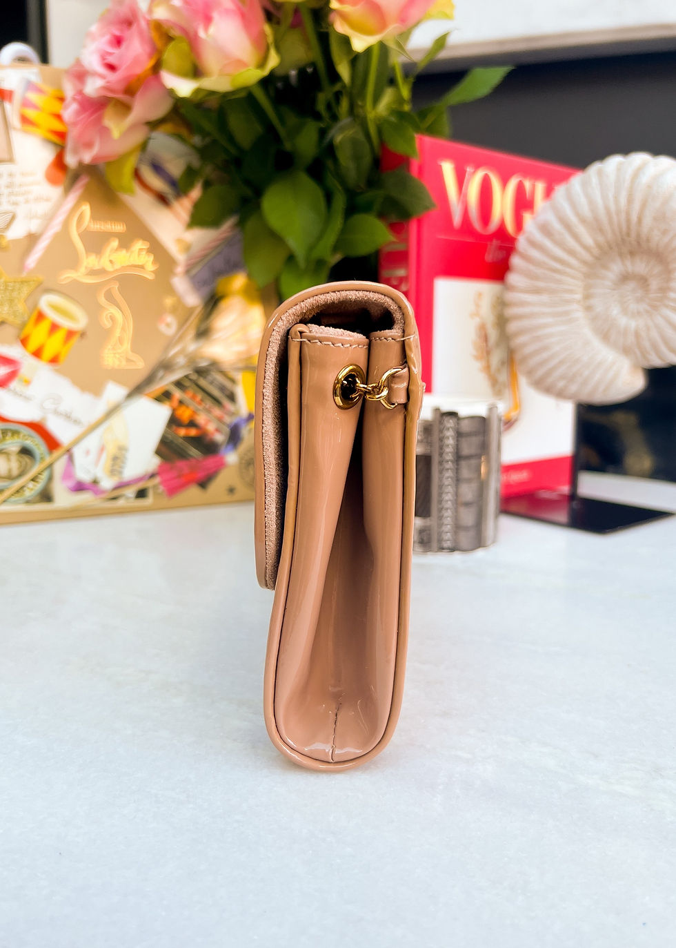 Thumbnail: Christian Louboutin Riviera Clutch with chain, nude with gold hardware.