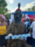 A Nomoli figure, whose likeness is incorporated into the baton design.