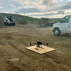 Drone outside at construction site.