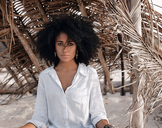 Big Curly hair Lady thats enjoying her new cut and Style
