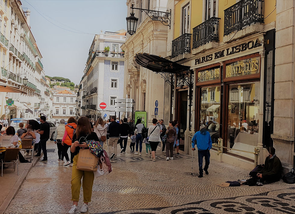 The main street in the Chiado quarter. Paris em Lisboa is one of the several shops that in the past supplied the new money with high quality imported homeware goods.