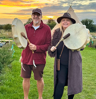 neil and caroline playing frame drums