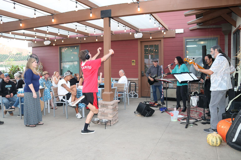 client dancing during happy hour.JPG